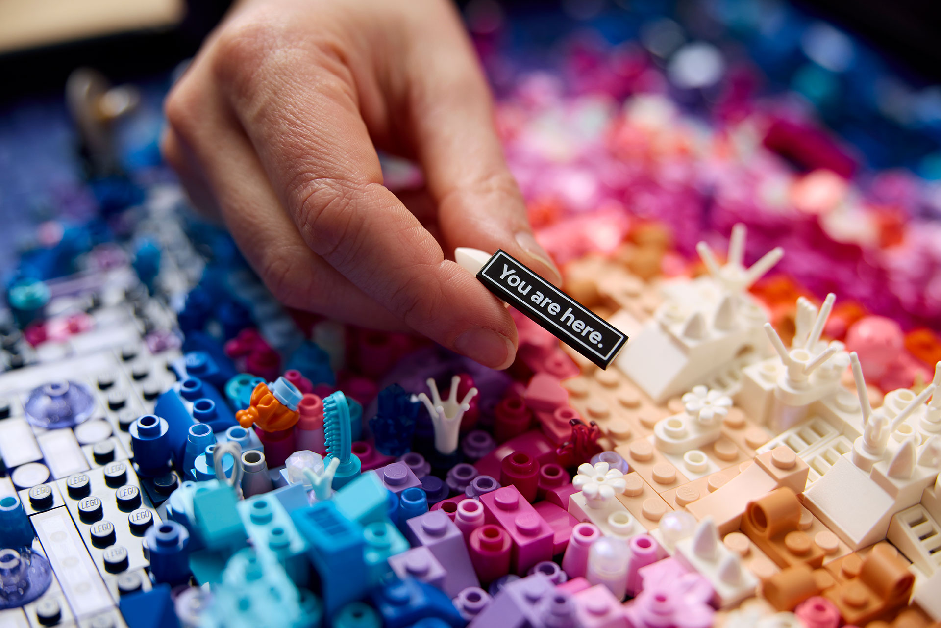 The Lego Art The Milky Way Galaxy set includes many details such as astronomical highlights and a "You are here." sign.