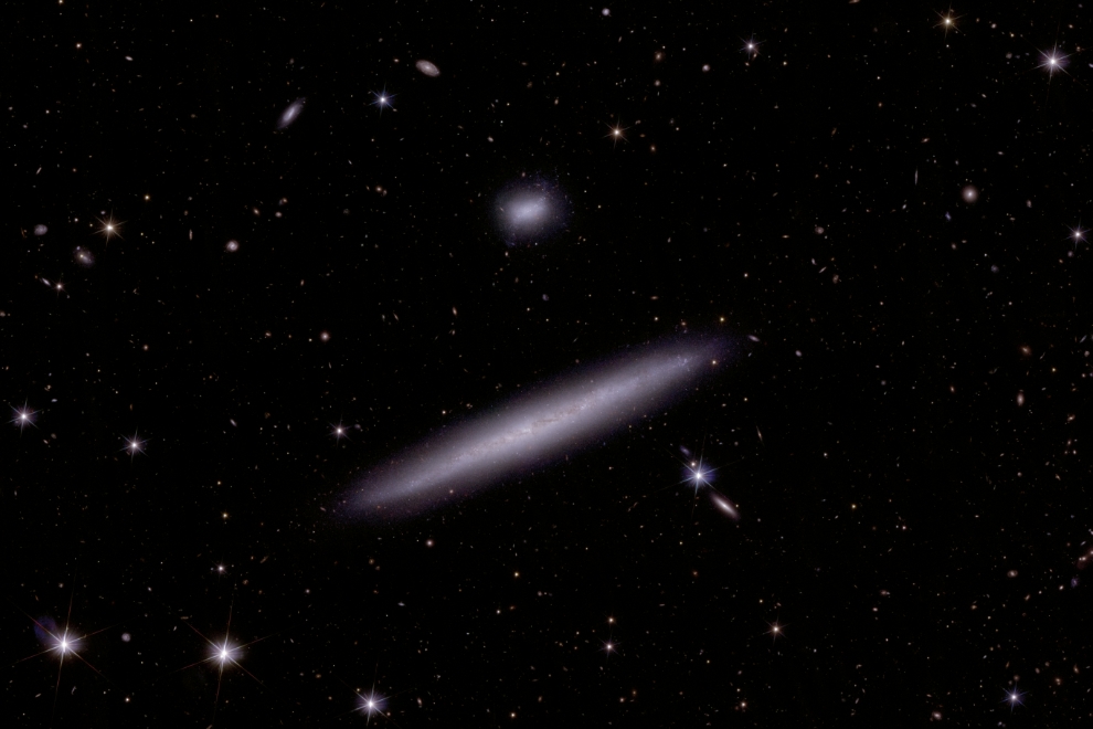 This image is a higher resolution, close-up cutout from a larger frame of the Dorado Group, and shows two of the group’s constituent dwarf galaxies (visible to the upper left in the wider frame). Image credit: ESA/Euclid/Euclid Consortium/NASA, image processing by J.-C. Cuillandre (CEA Paris-Saclay), G. Anselmi; CC BY-SA 3.0 IGO or ESA Standard Licence