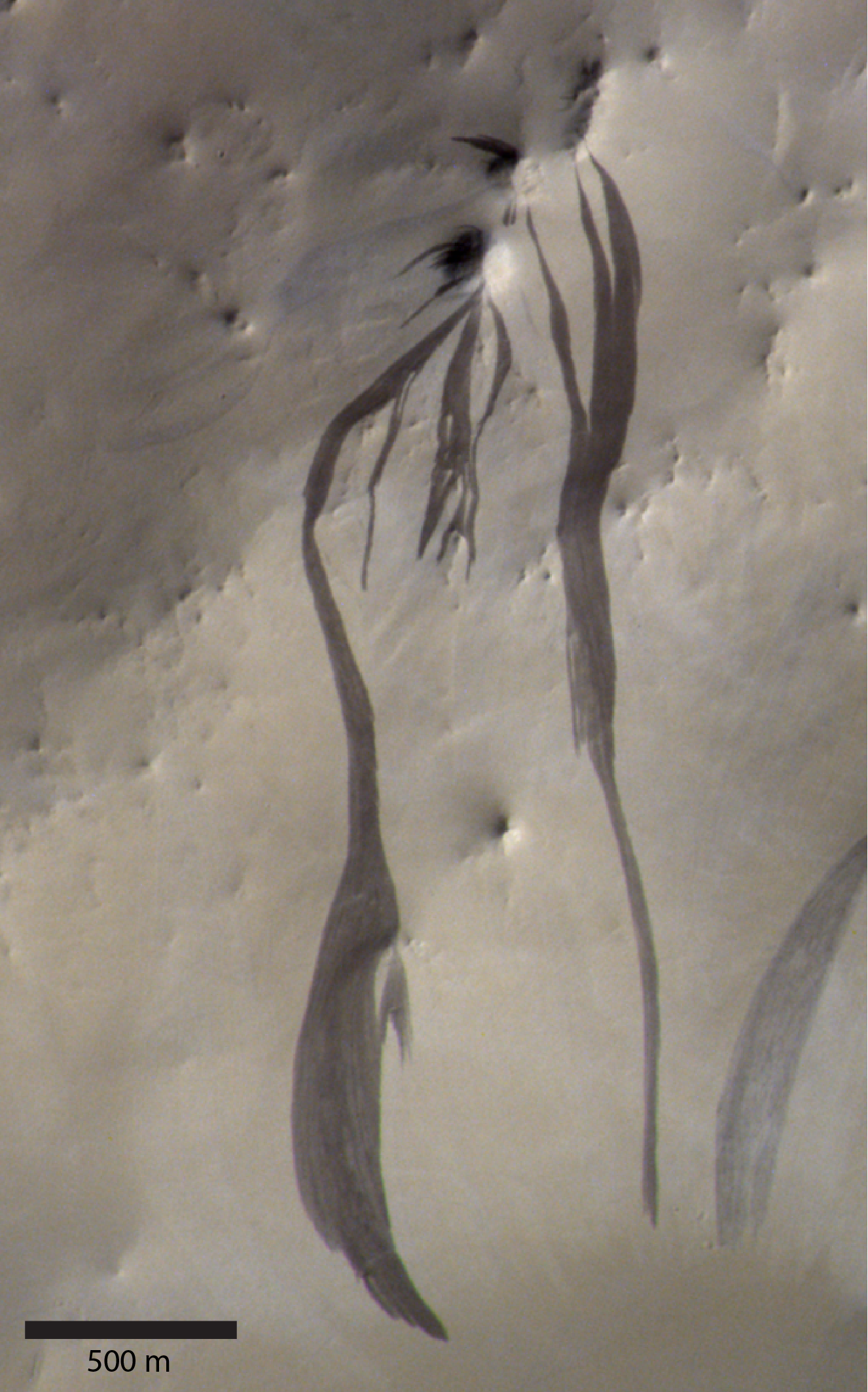 Dark streaks on Mars may not come from water after all, scientists say