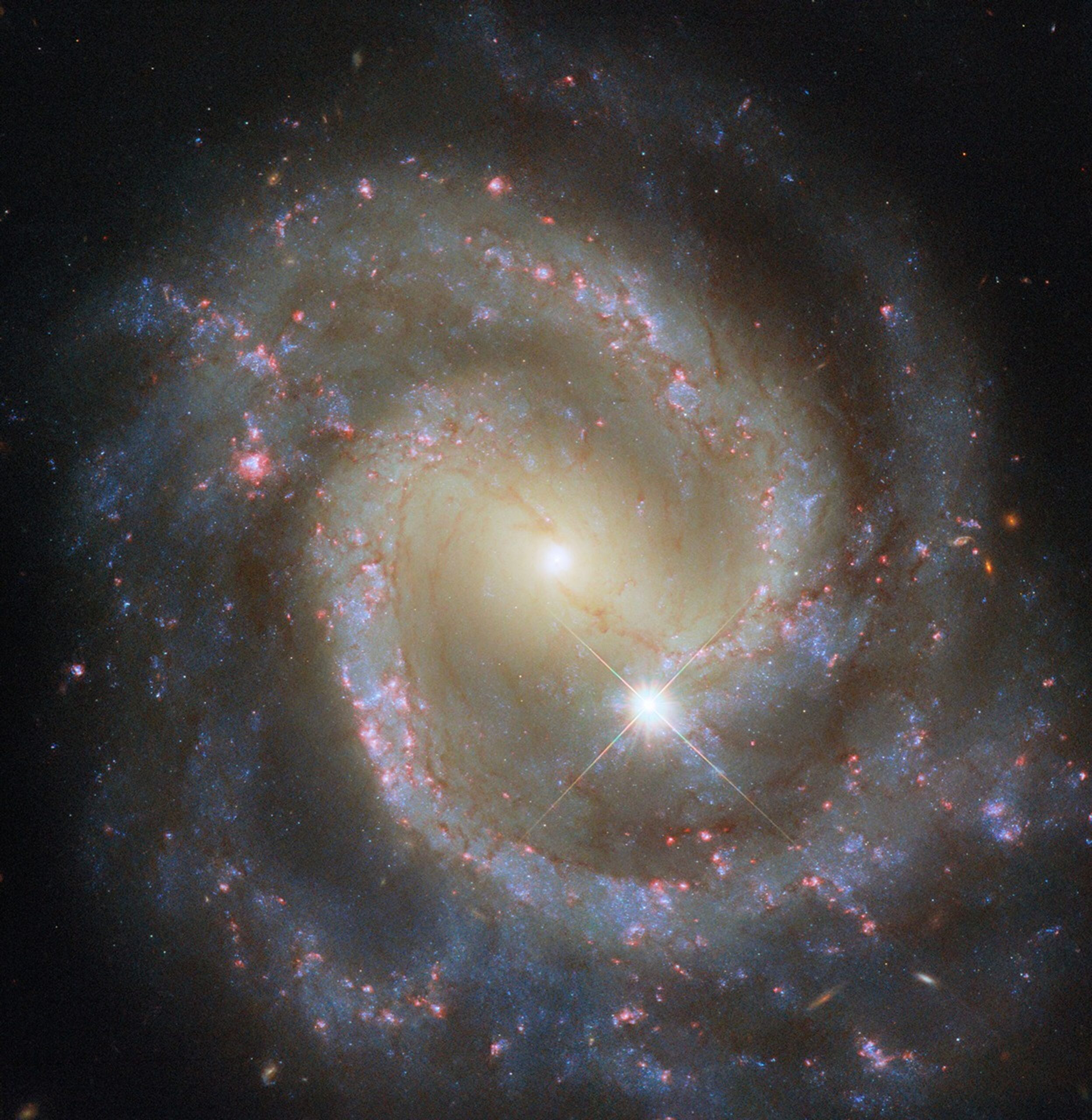 Hubble Spies Paired Pinwheel on Its Own