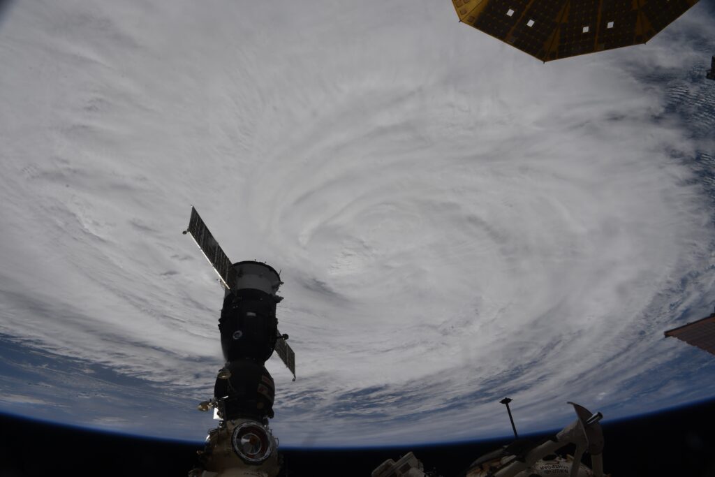 How do hurricanes and tropical storms get their names?