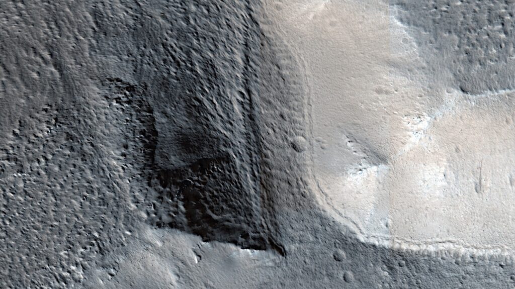 Closeup Look At An Ancient Crater Lake Outlet On Mars