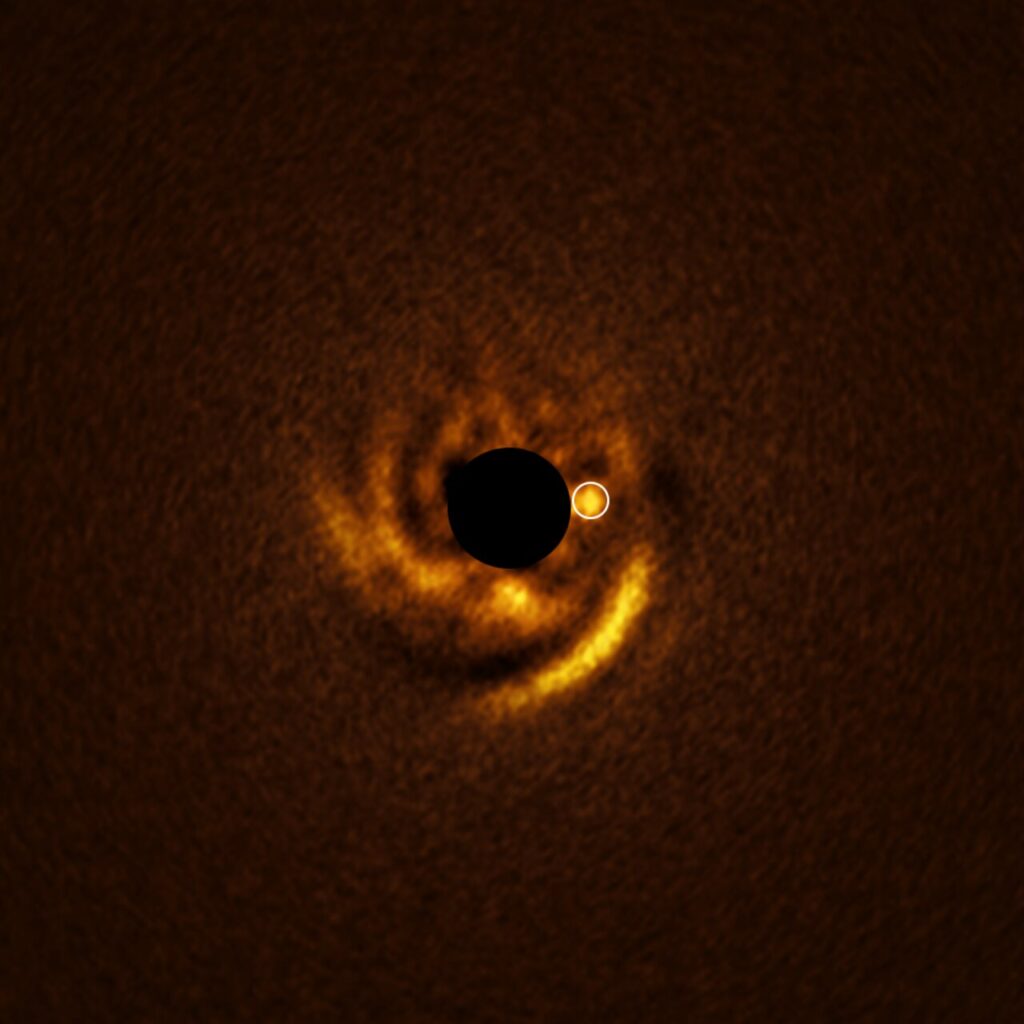 What are these strange swirls around an infant star? 'We may be watching a planet come into existence in real time'