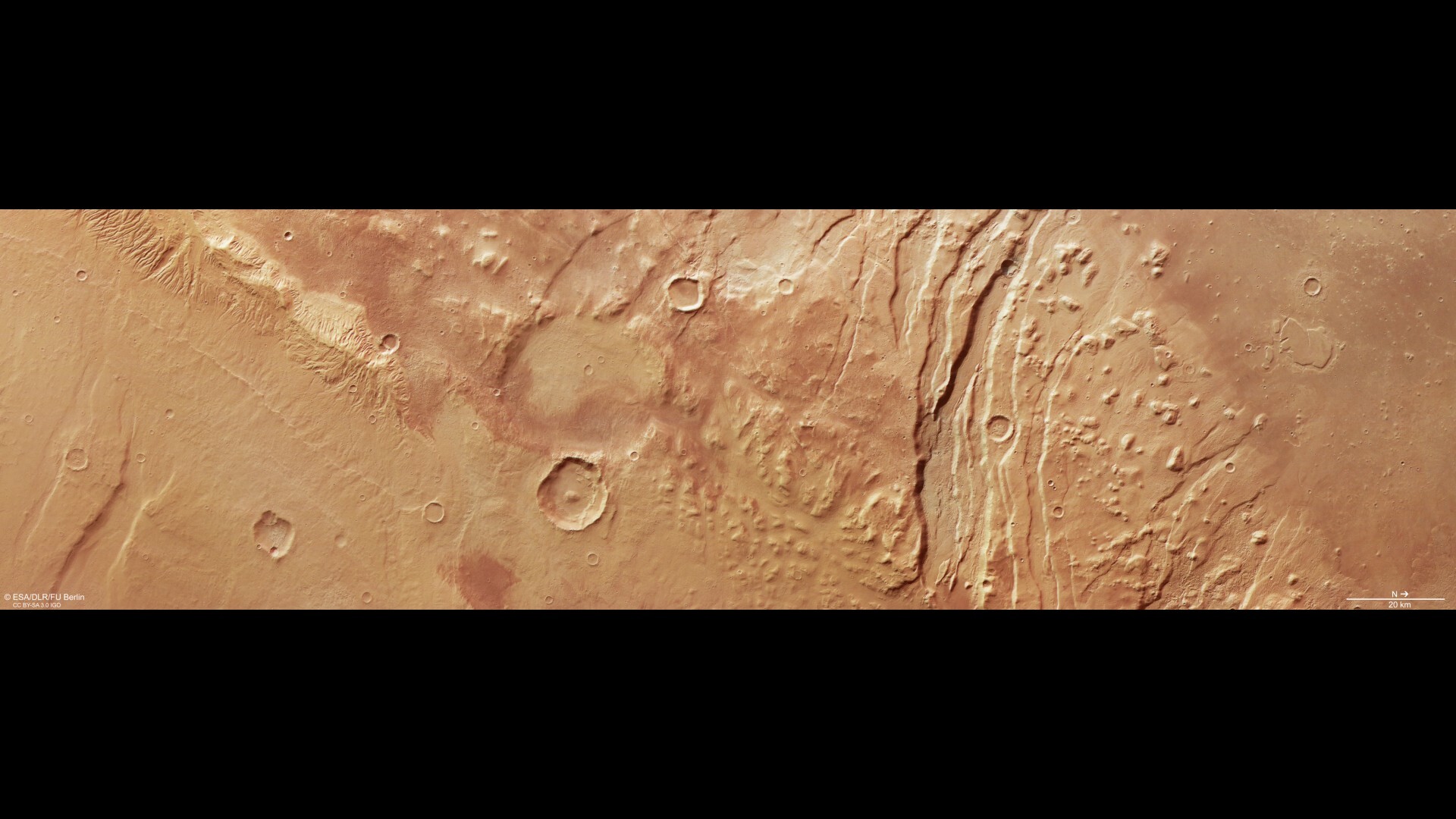 Mars orbiter looks deep into chasms and valleys on the Martian surface