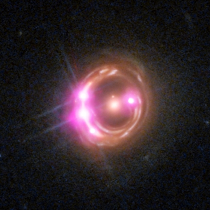 Warped spacetime with surprise 'double-zoom' reveals radiation around distant supermassive black hole