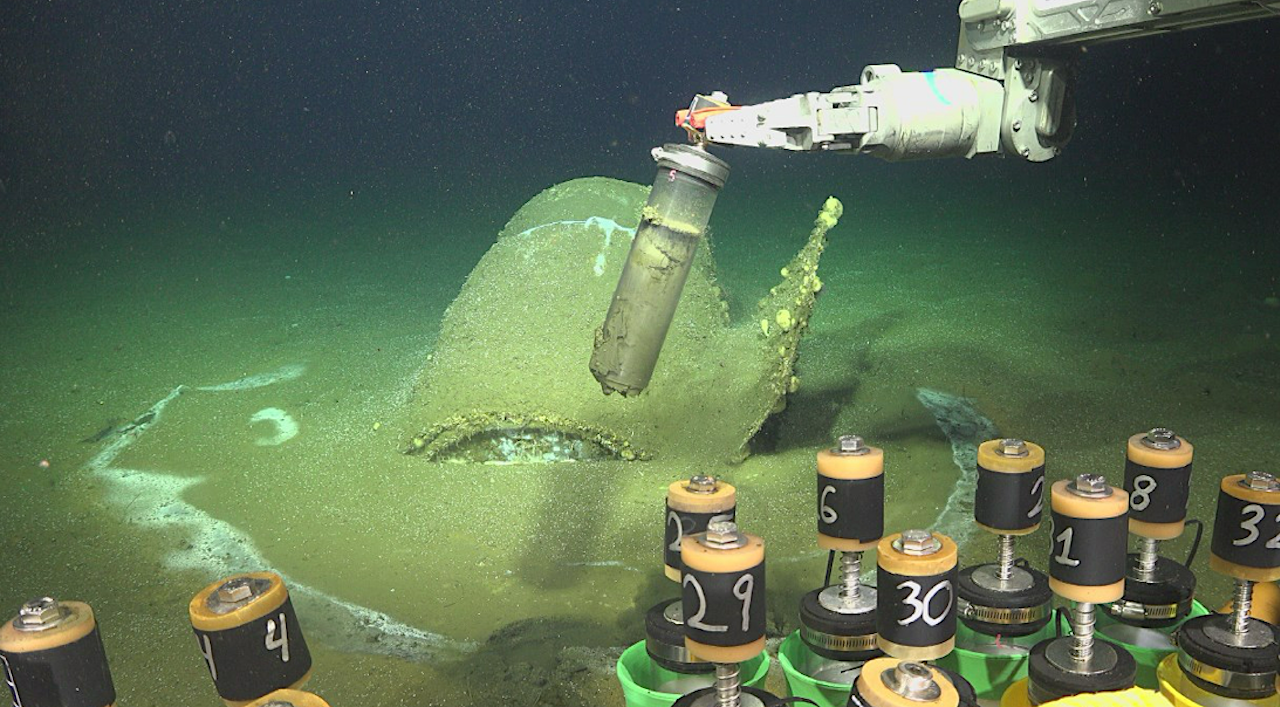 Extremophile Hotspots Linked To Containerized Industrial Waste Dumping In A Deep-sea Basin