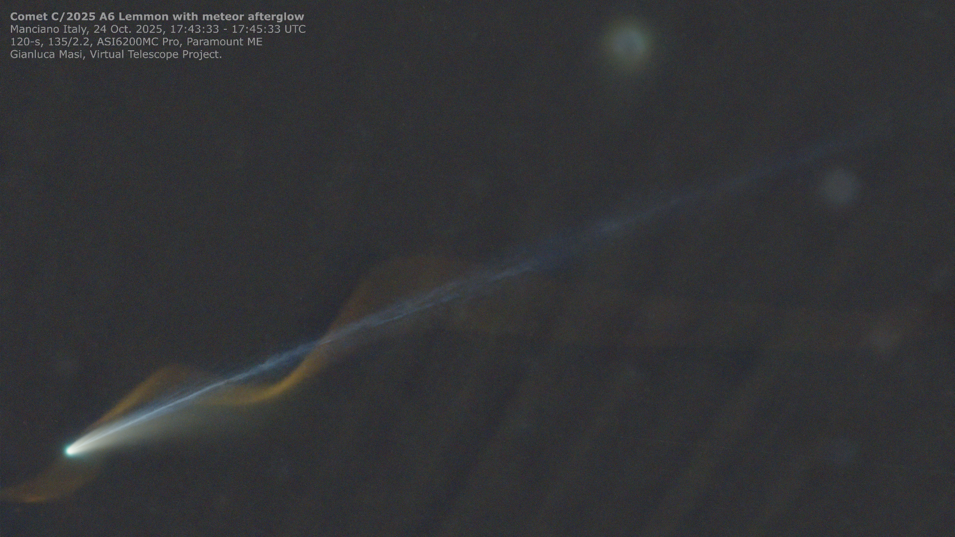 Glowing meteor trail photobombs Comet Lemmon in incredible telescope footage. 'A pure perspective miracle'