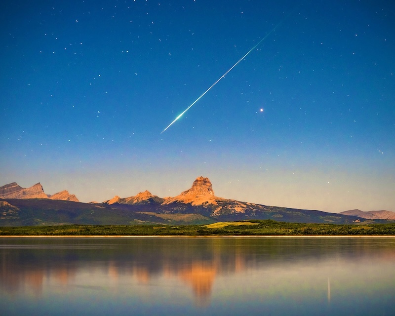 How high up are meteors when they begin to glow?