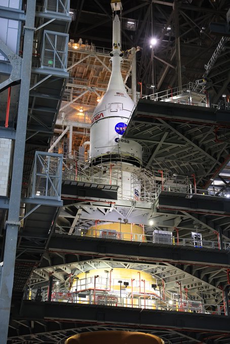 NASA stacks Artemis 2 moon mission's Orion capsule atop SLS rocket ahead of 2026 launch