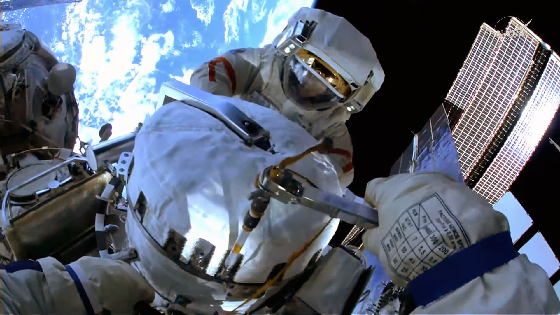 Russian cosmonauts install semiconductor experiment, jettison old HDTV camera during spacewalk outside ISS