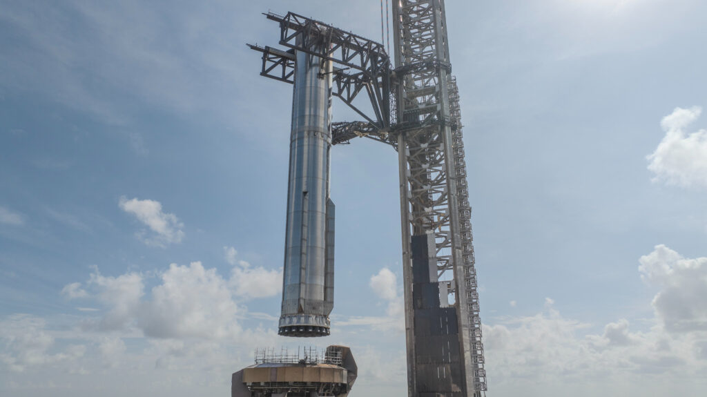 SpaceX moves giant Super Heavy booster to pad ahead of Starship Flight 11 launch (photos)