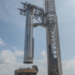 SpaceX moves giant Super Heavy booster to pad ahead of Starship Flight 11 launch (photos)