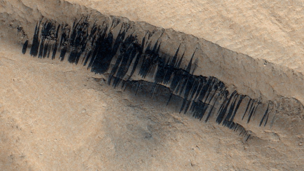 Origins Of Streak Features On Mars
