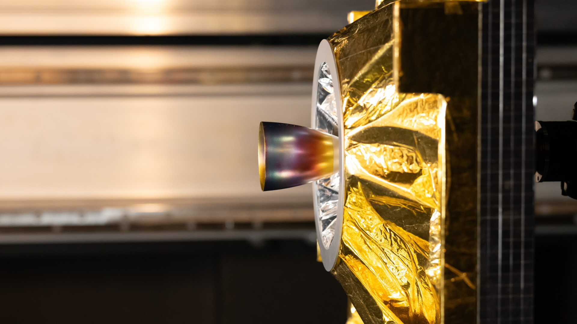Golden satellite insulation sparkles during test | Space photo of the day for Dec. 30, 2025