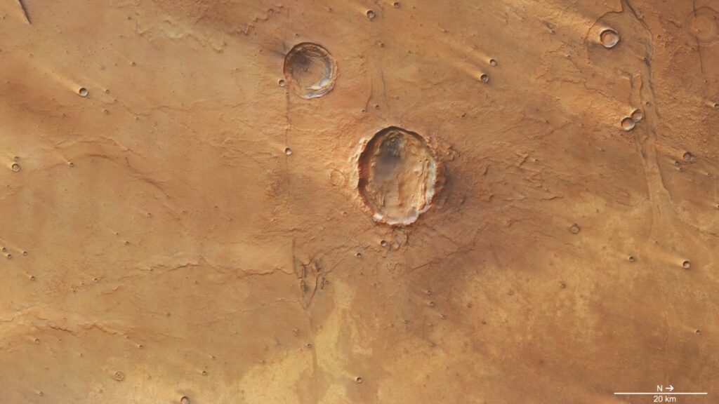 Mars orbiter sees 'butterfly' crater spread its wings on the Red Planet