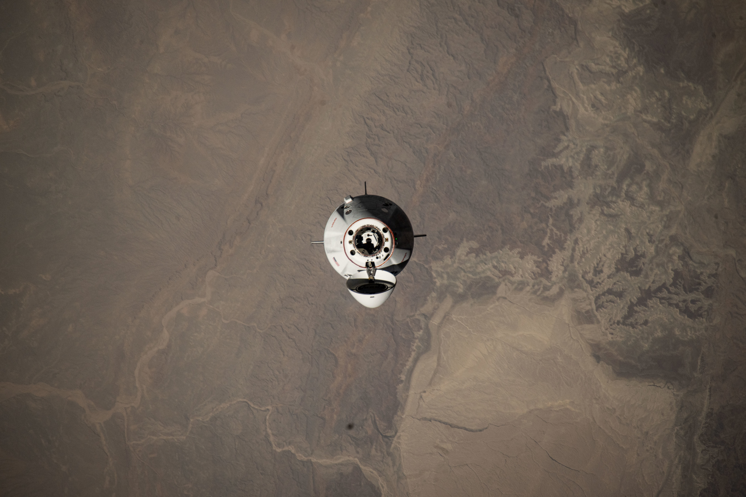 Crew-11 spacecraft returns safely to Earth after expedited mission due to medical issue