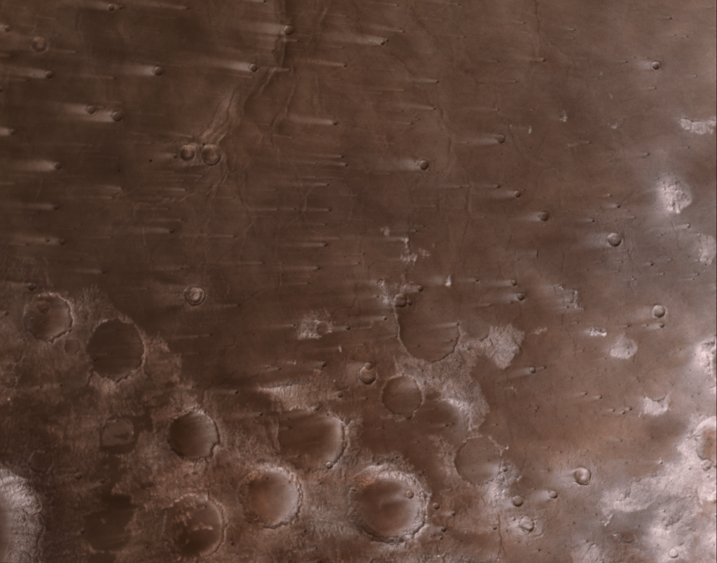 NASA’s Psyche Mission Spies Mars’ Wind-Blown Craters During Close Approach
