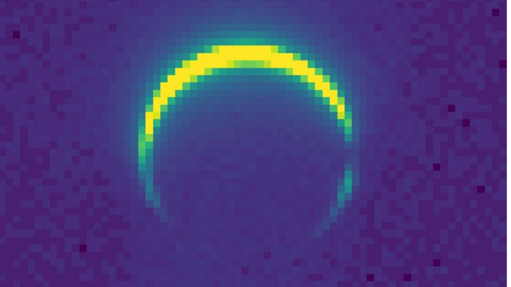 No, this isn't a solar eclipse. It's an image of Mars, captured by NASA's asteroid-bound Psyche probe