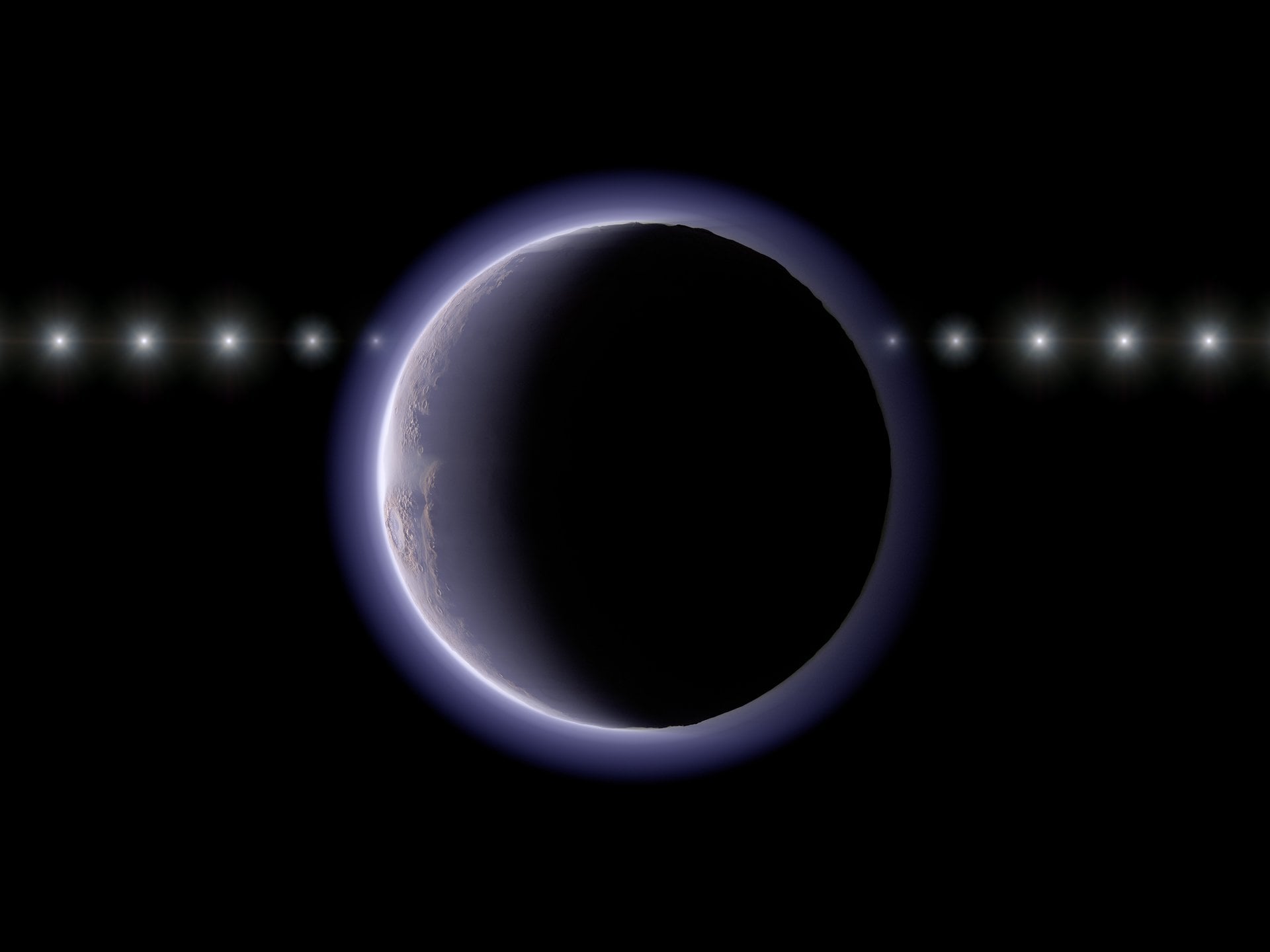 Pluto-Like World's Thin Atmosphere Poses a Mystery for Astronomers