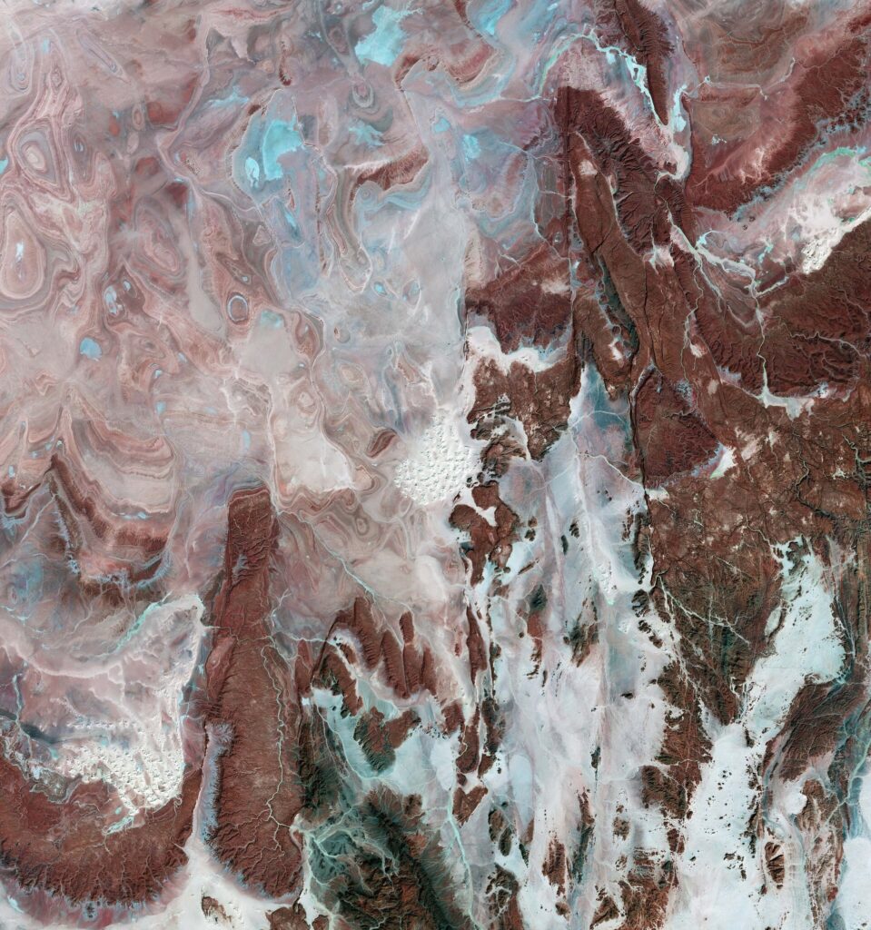 Satellite Imagery Reveals Stunning Complexity of Algeria’s Tanezrouft Basin Amid Dust Storms